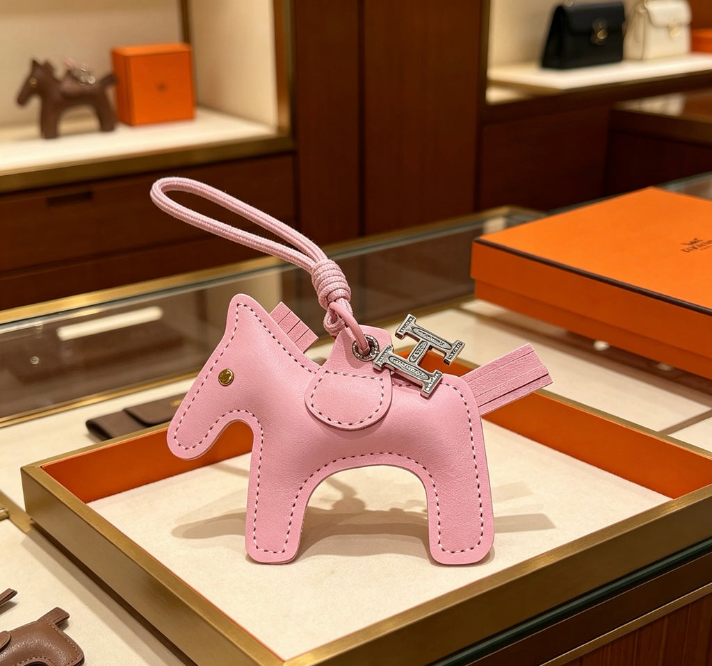 Hermès Pink Leather Horse Bag Charm - album image 1