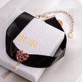 Dior Black Choker with Red Floral Medallion - product image 1