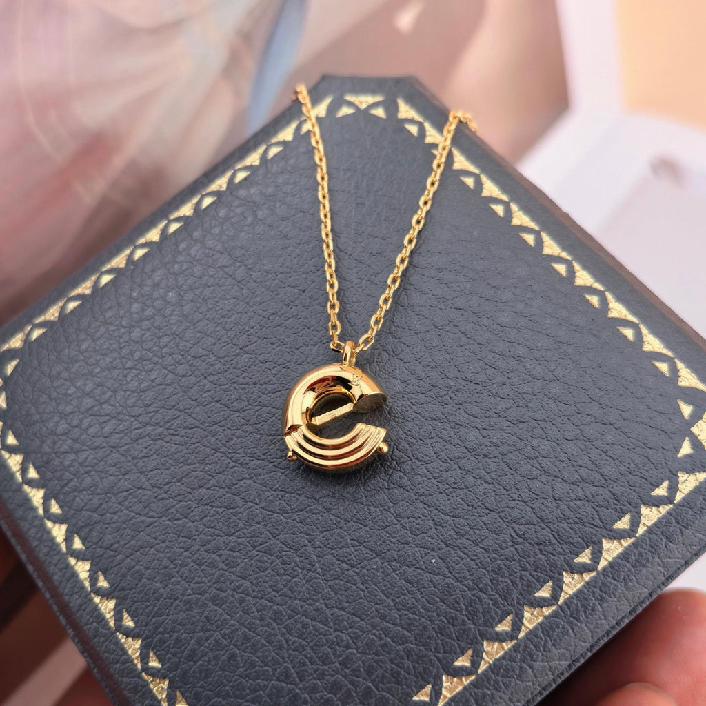Louis Vuitton Gold-Tone Circular Pendant Necklace - album image 6