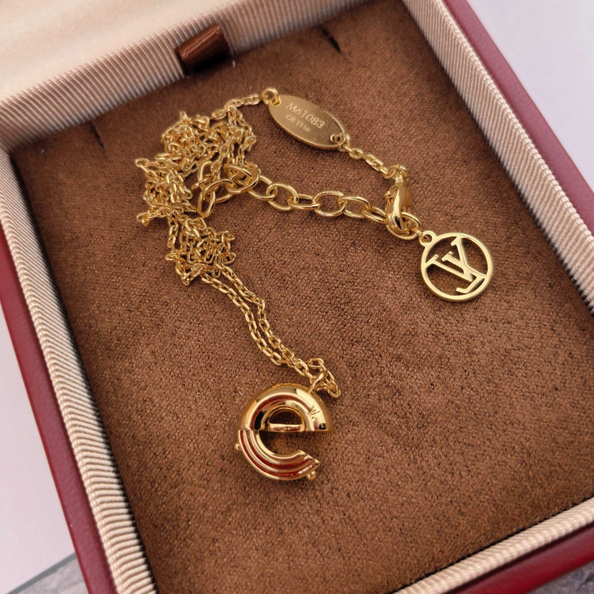 Louis Vuitton Gold-Tone Circular Pendant Necklace - album image 4
