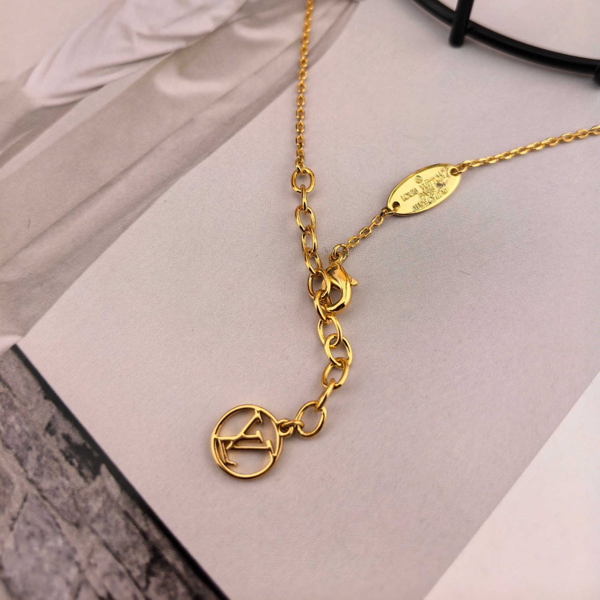 Louis Vuitton Gold-Tone Circular Pendant Necklace - album image 9