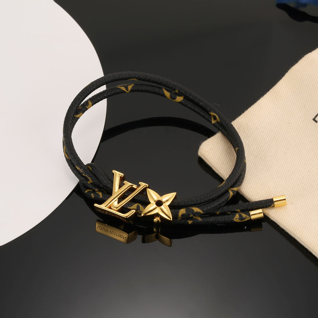 Louis Vuitton Circle Gold-Tone Leather Bracelet - album image 1