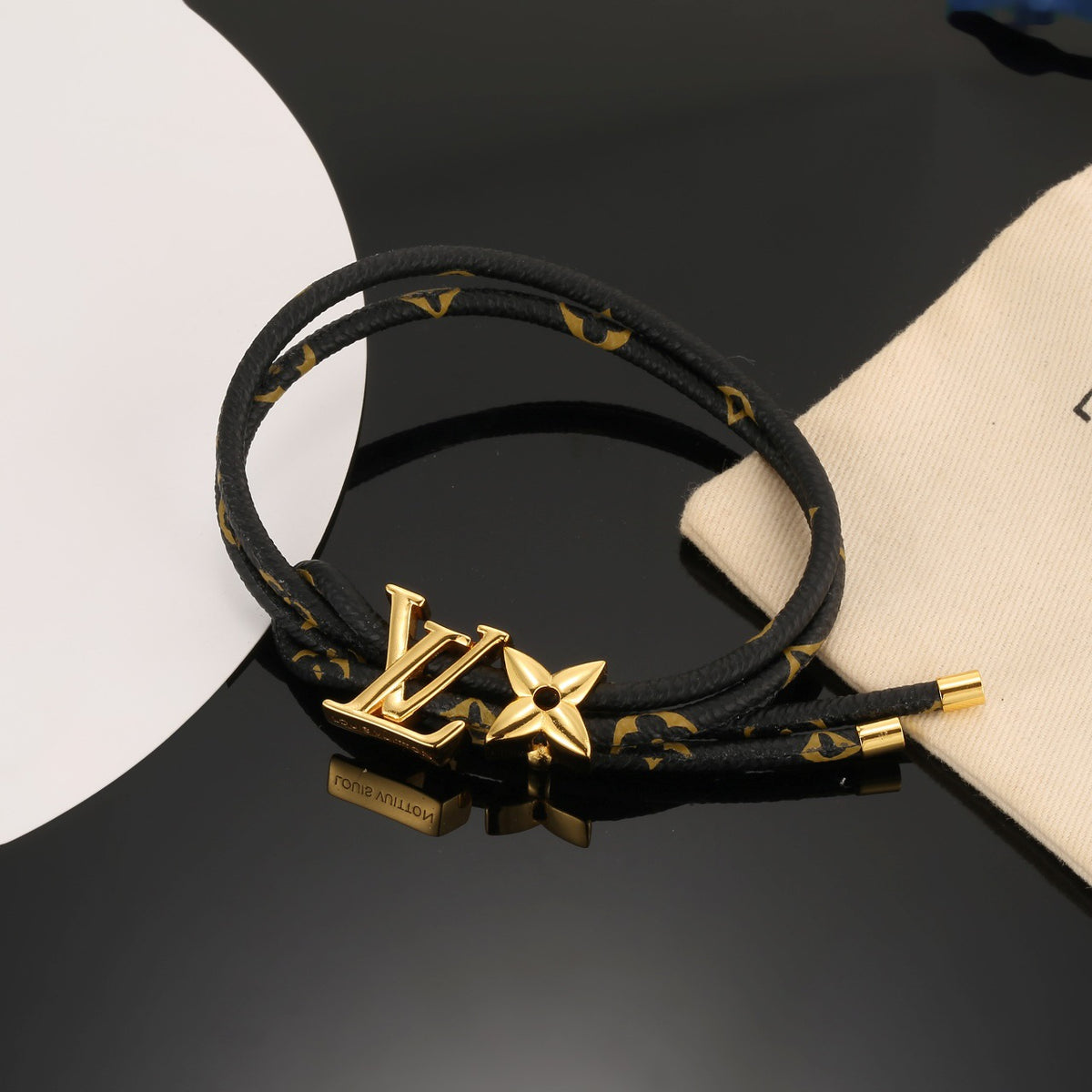 Louis Vuitton Circle Gold-Tone Leather Bracelet - album image 1