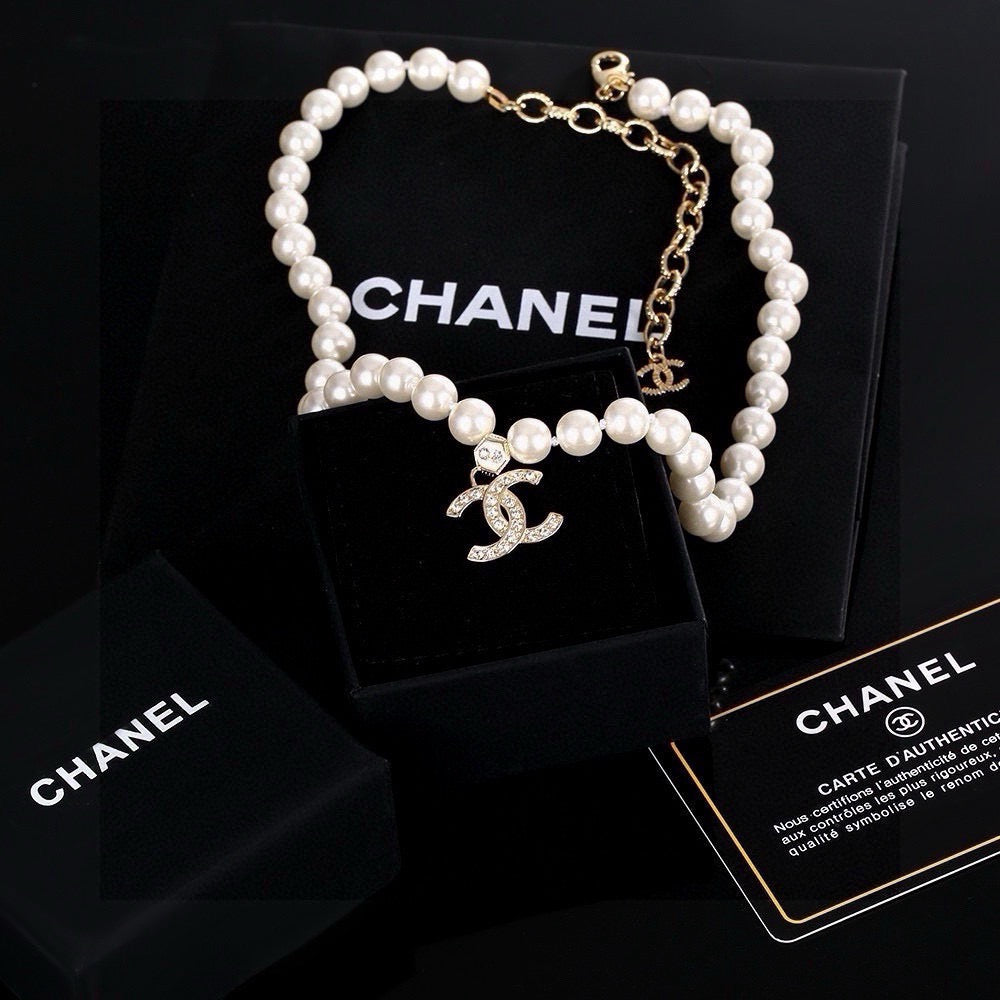 Chanel Interlocking C Pearl Crystal Accent Necklace - album image 1