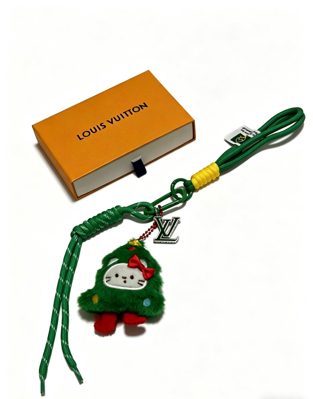Louis Vuitton Green Strap Keychain with Red and Green Character - album image 1