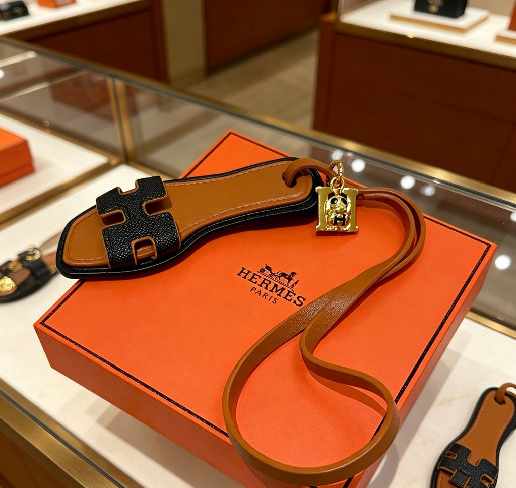 Hermès Black and Tan Leather H Bracelet - album image 5