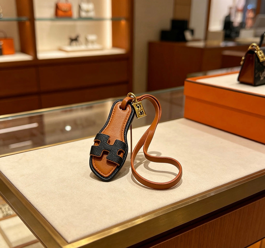 Hermès Black and Tan Leather H Bracelet - album image 6