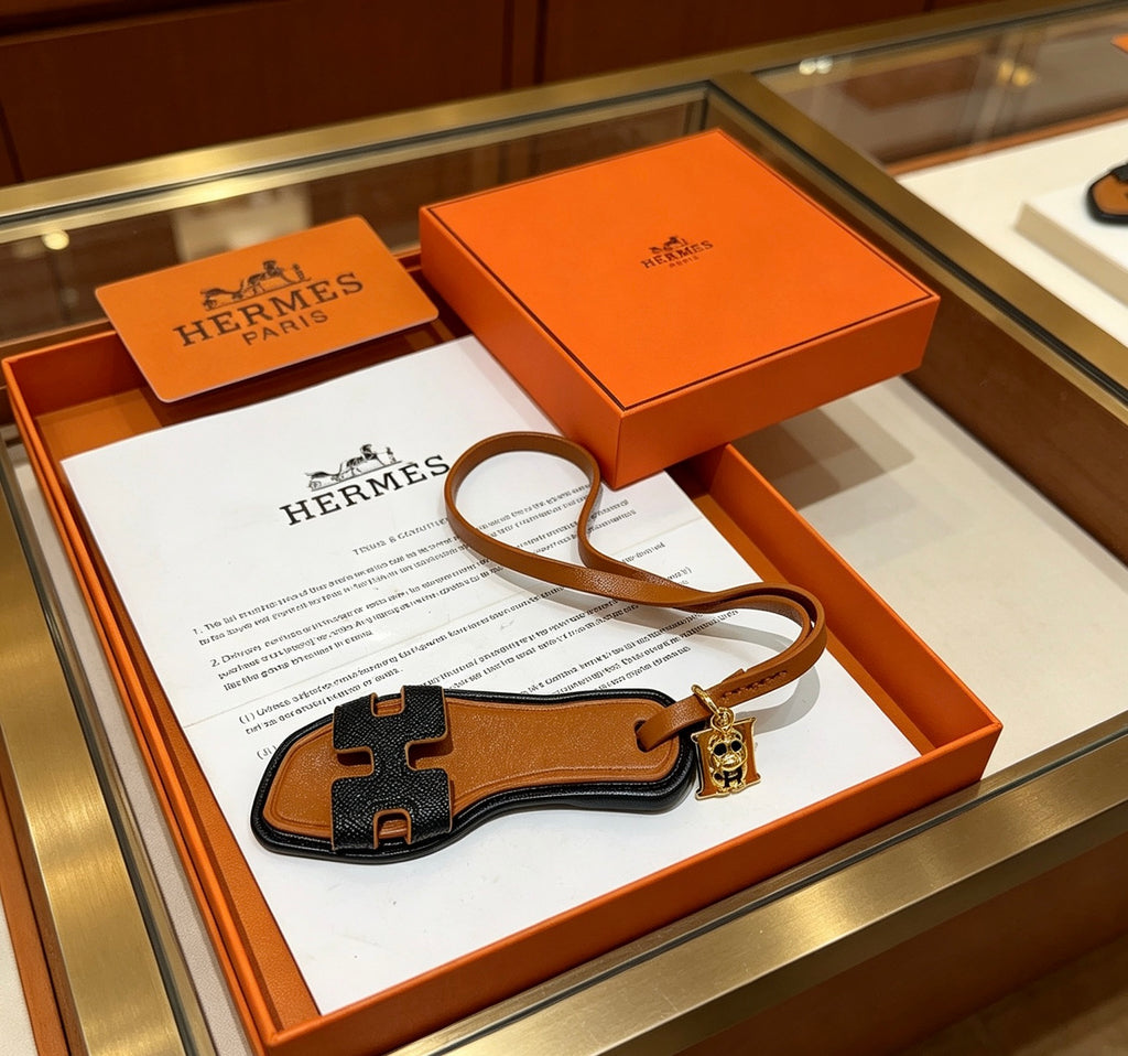 Hermès Black and Tan Leather H Bracelet - album image 3
