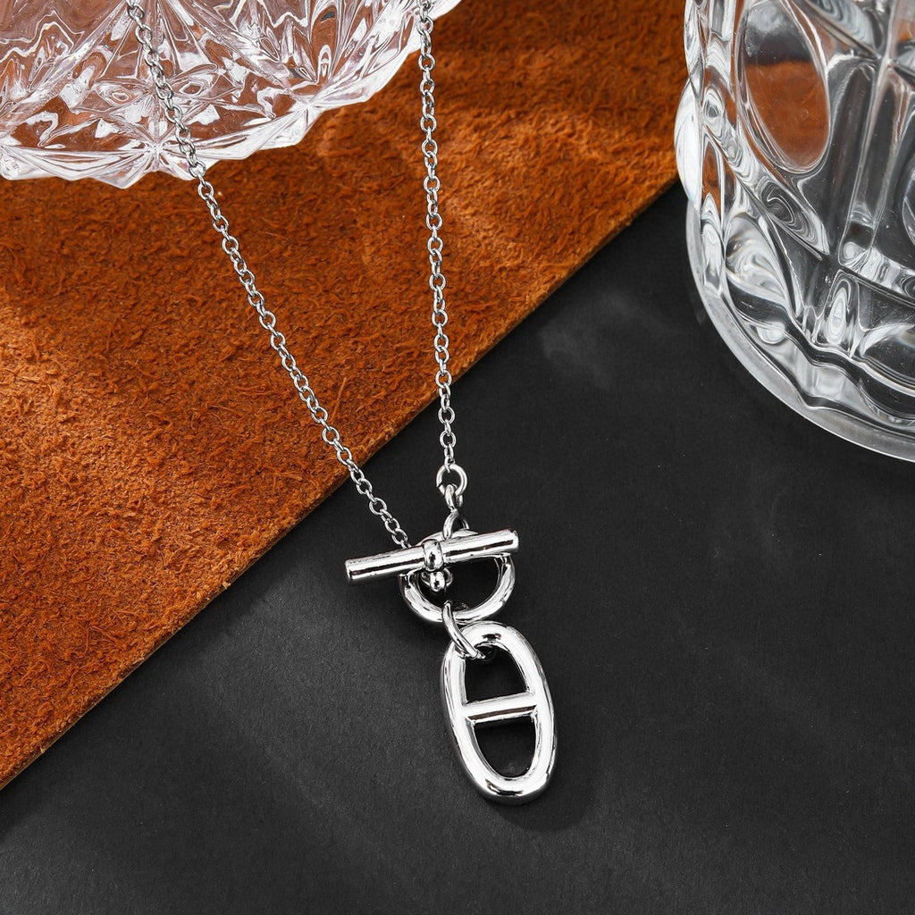 Hermès Silver and Rose Gold-Tone Sculptural Pendant Necklace - album image 8