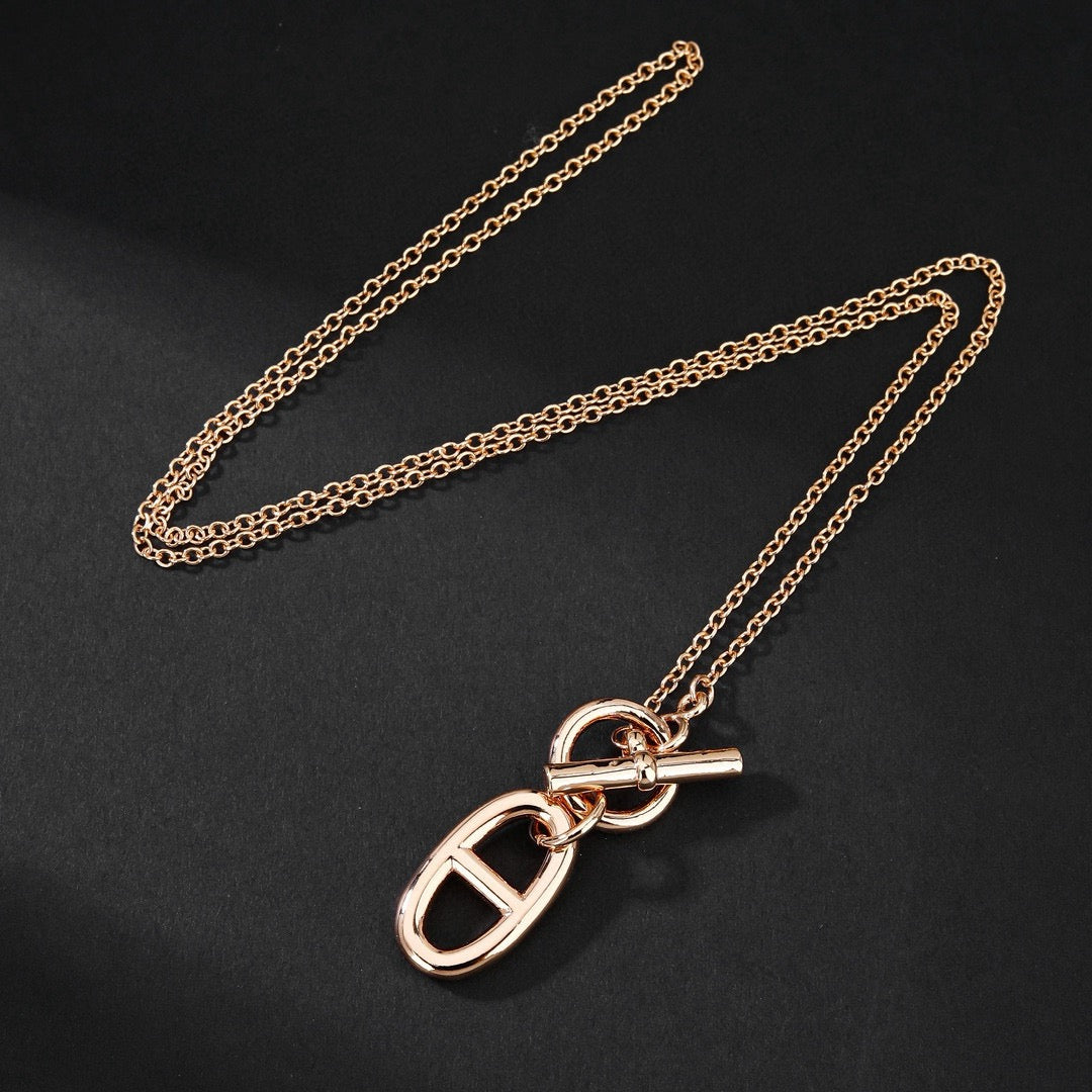 Hermès Silver and Rose Gold-Tone Sculptural Pendant Necklace - album image 3