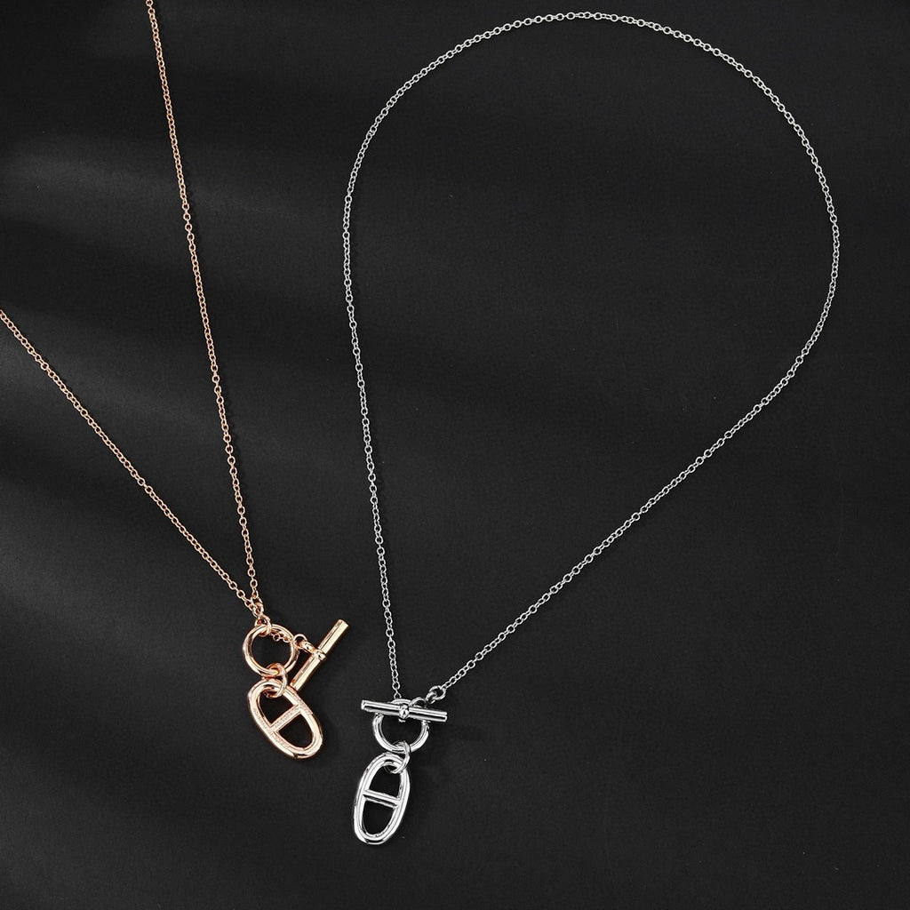 Hermès Silver and Rose Gold-Tone Sculptural Pendant Necklace - album image 1
