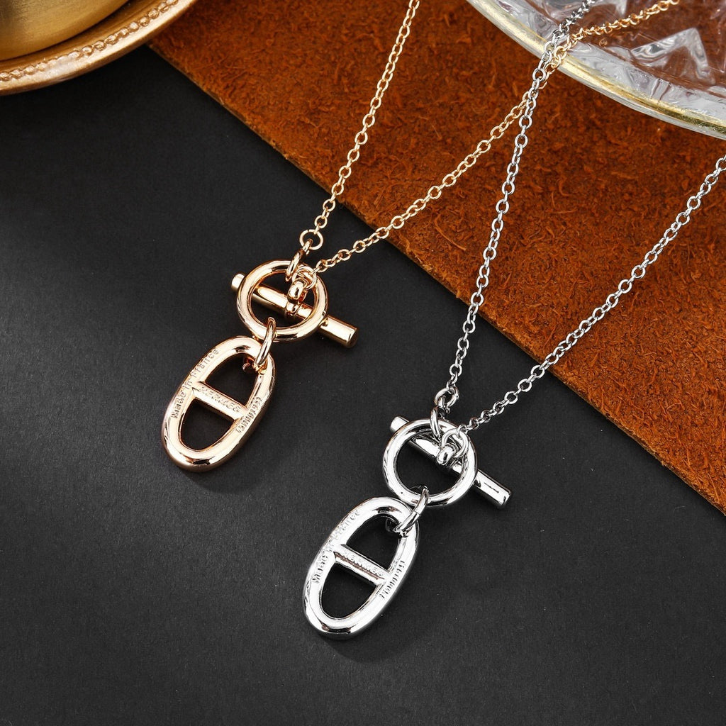 Hermès Silver and Rose Gold-Tone Sculptural Pendant Necklace - album image 6