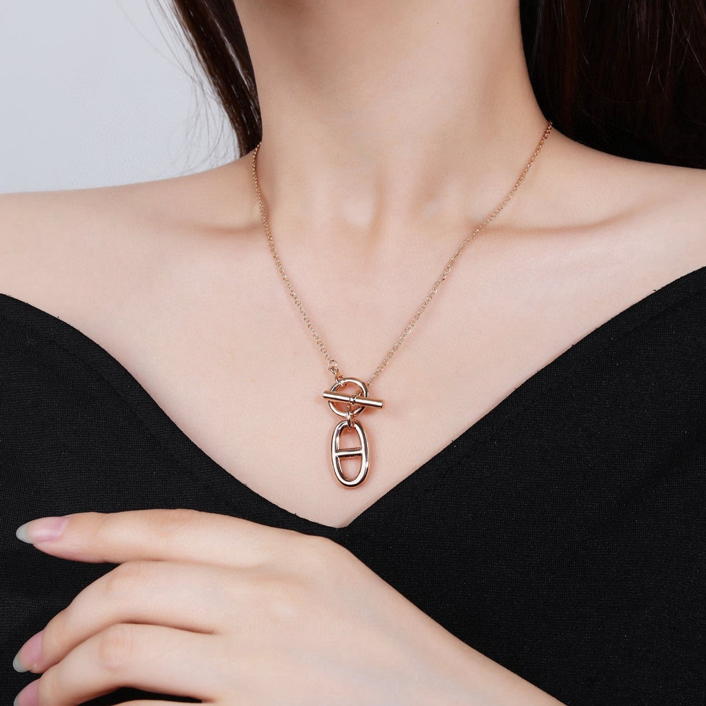 Hermès Silver and Rose Gold-Tone Sculptural Pendant Necklace - album image 2