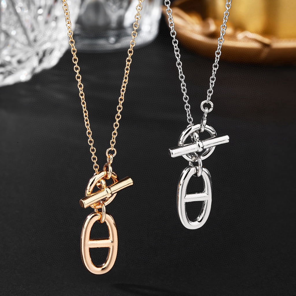 Hermès Silver and Rose Gold-Tone Sculptural Pendant Necklace - album image 4