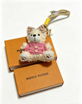Louis Vuitton White Plush Bear Bag Charm in Pink Outfit - album image 1