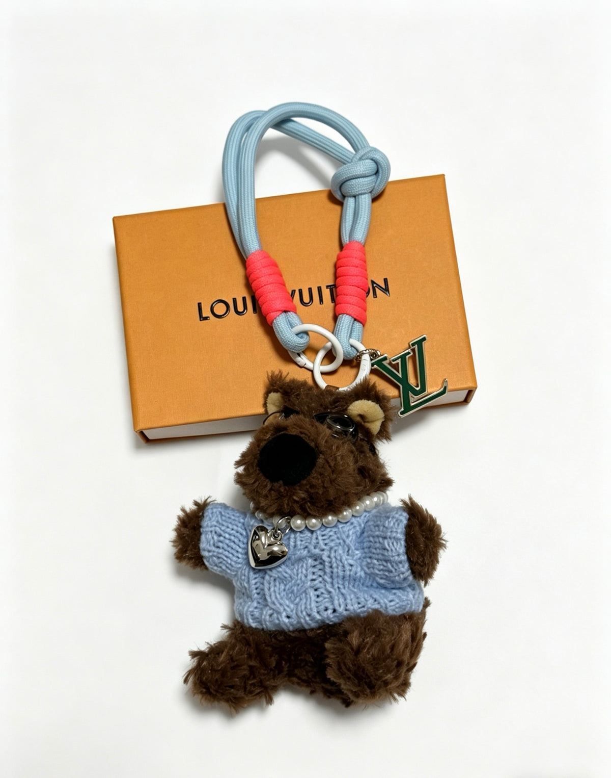 Louis Vuitton Brown Plush Bear Bag Charm in Blue Outfit - album image 1