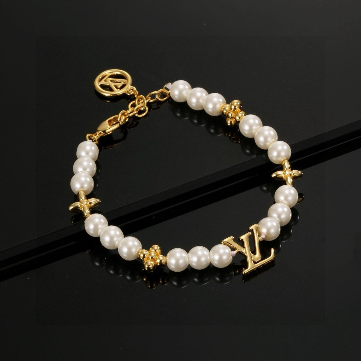 Louis Vuitton LV Letter Bracelet - album image 1