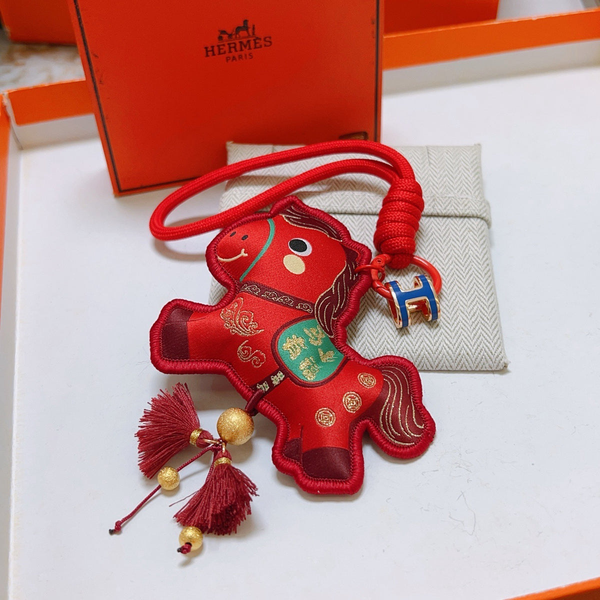 Hermès Red Flower-Charm Keychain with Red Braided Cord - album image 5