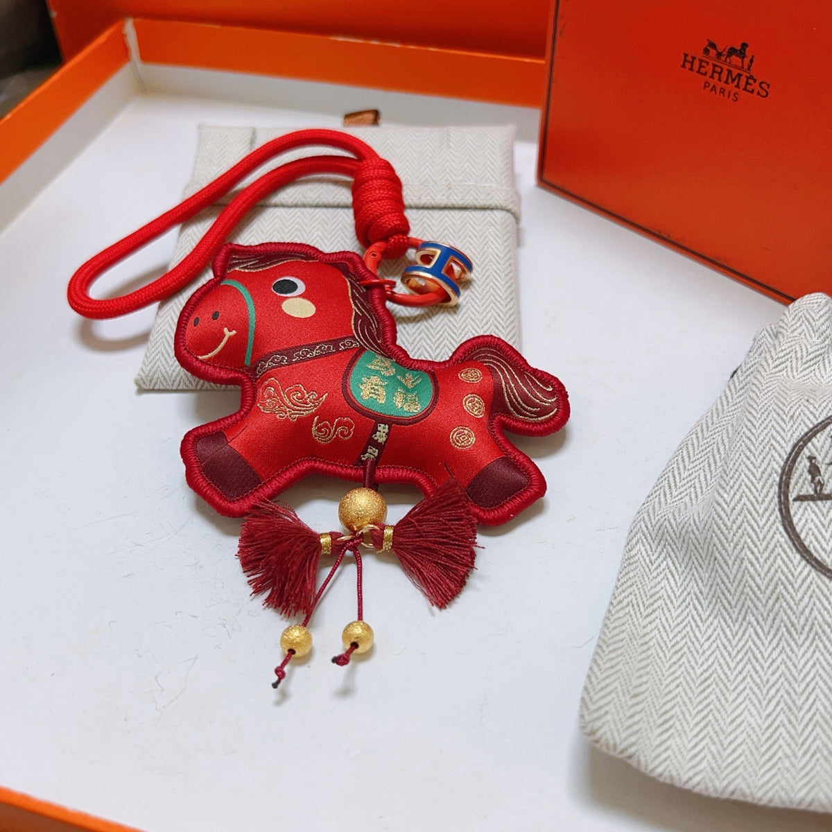 Hermès Red Flower-Charm Keychain with Red Braided Cord - album image 3