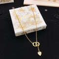 Dior Gold-Tone CD Mini Heart Necklace - product image 1