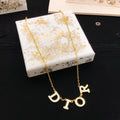 Dior Gold-Tone Spaced Letter Necklace - product image 1