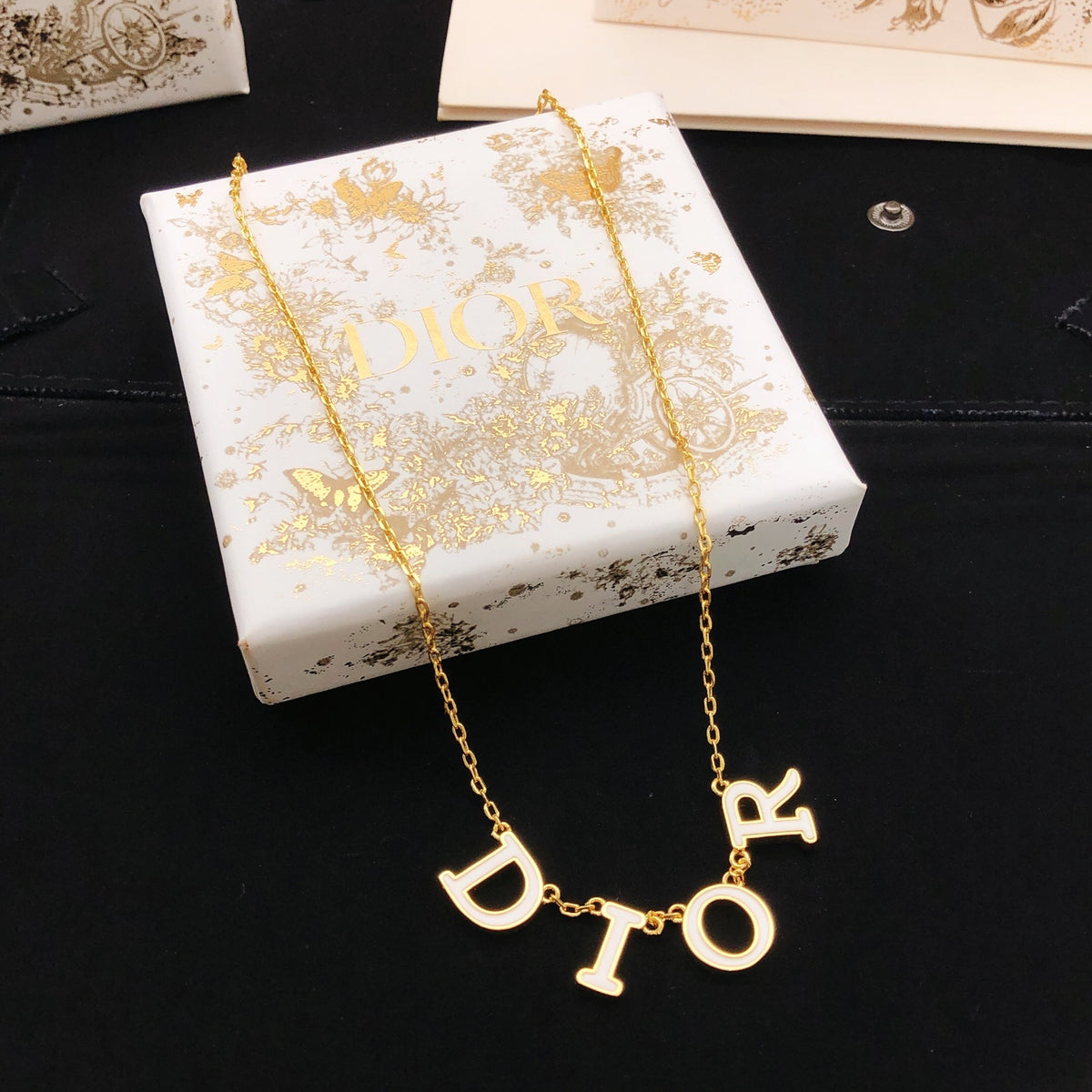 Dior Gold-Tone Spaced Letter Necklace - product image 1