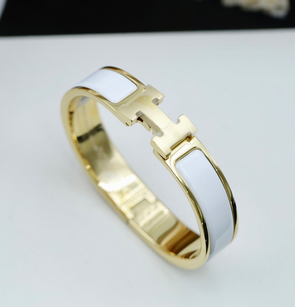 Hermès Gold-Tone White Enamel H-Clasp Bangle - album image 1