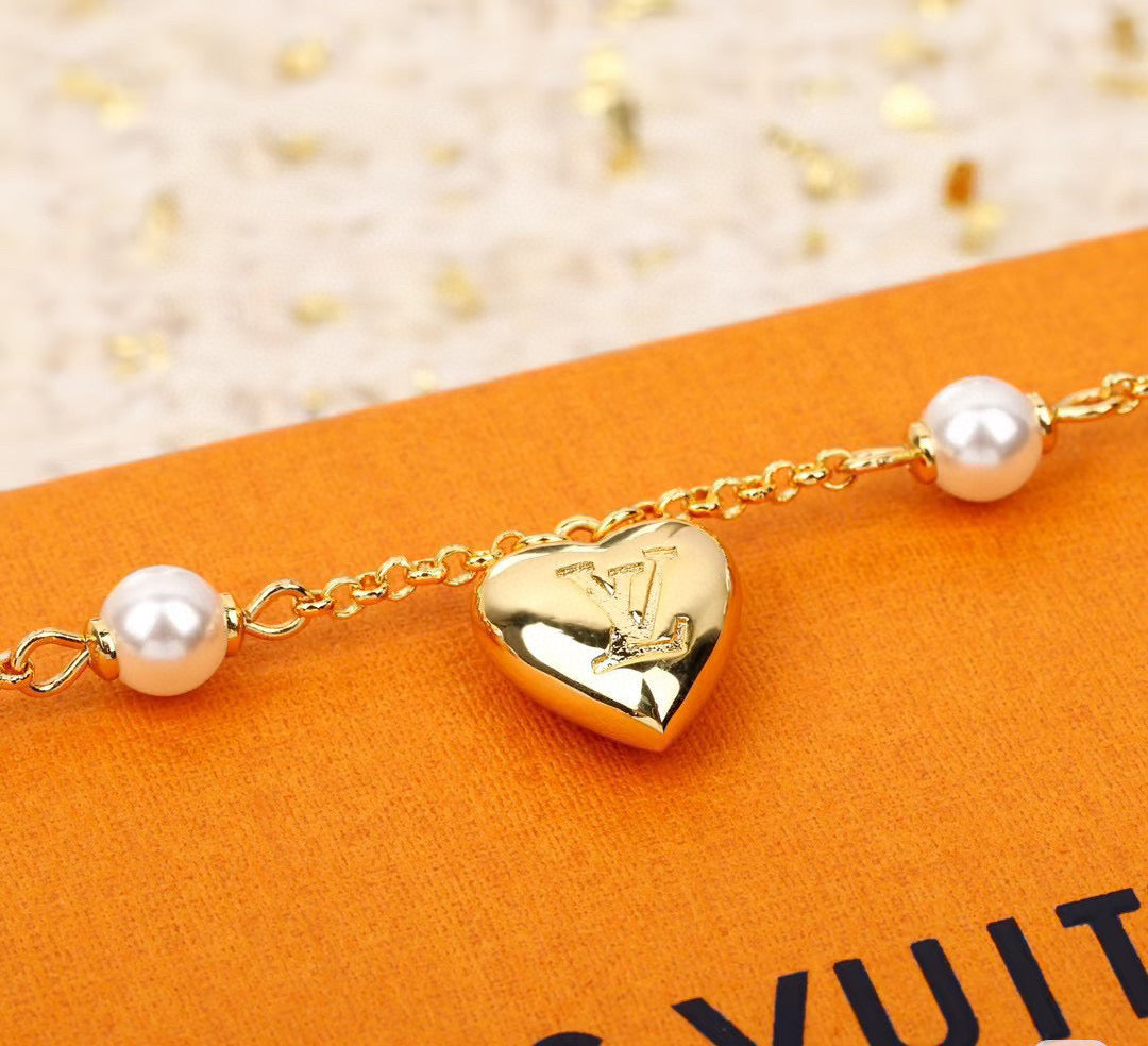Louis Vuitton Heart LV Letter Necklace - album image 4