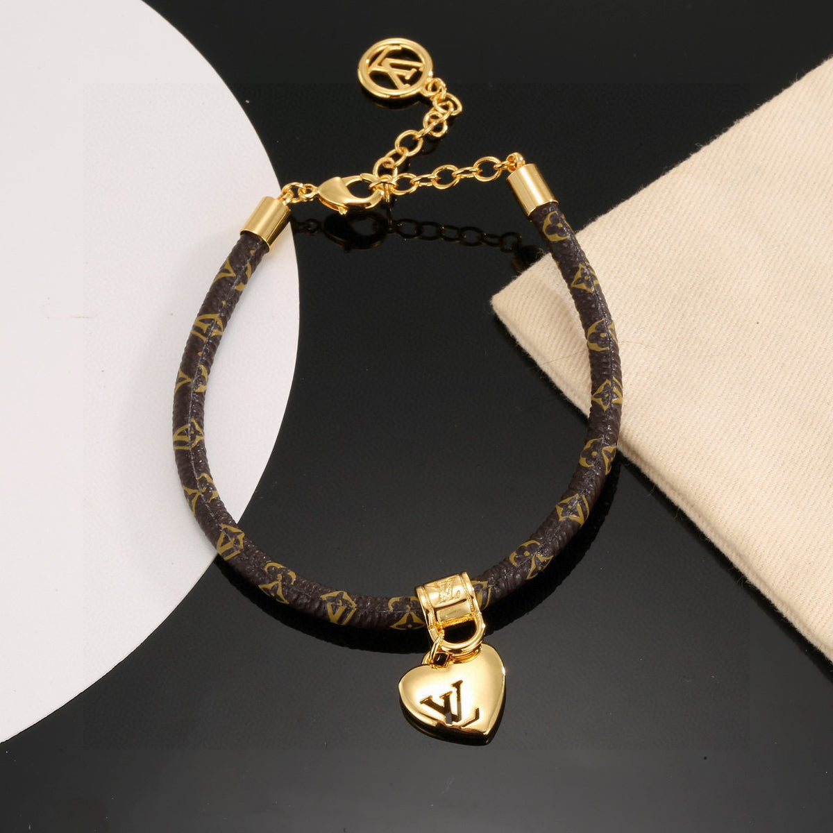 Louis Vuitton Circle Gold-Tone Leather Bracelet - album image 1