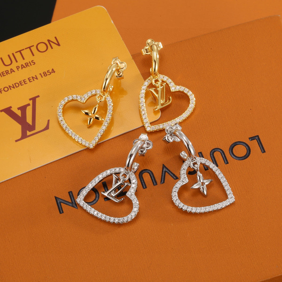 Louis Vuitton LV Letter Stud Earrings - album image 1