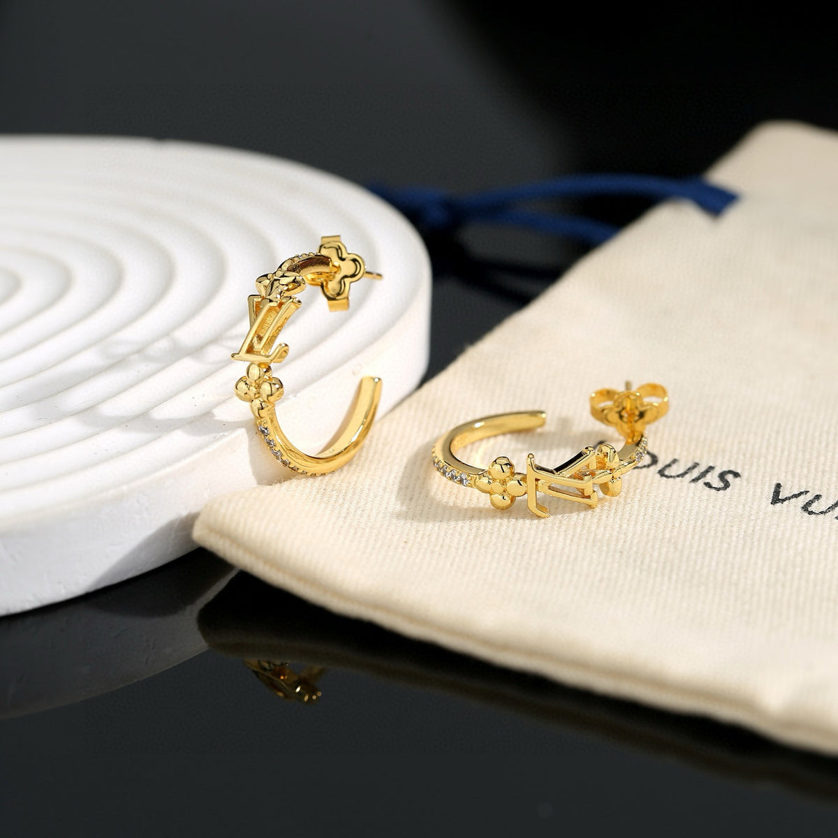 Louis Vuitton LV Letter Stud Earrings - album image 1