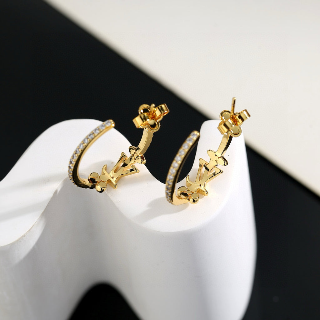 Louis Vuitton LV Letter Stud Earrings - album image 3