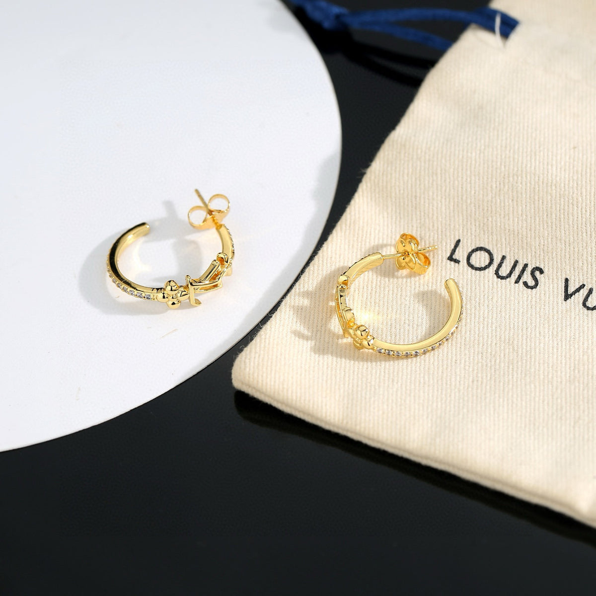 Louis Vuitton LV Letter Stud Earrings - album image 6