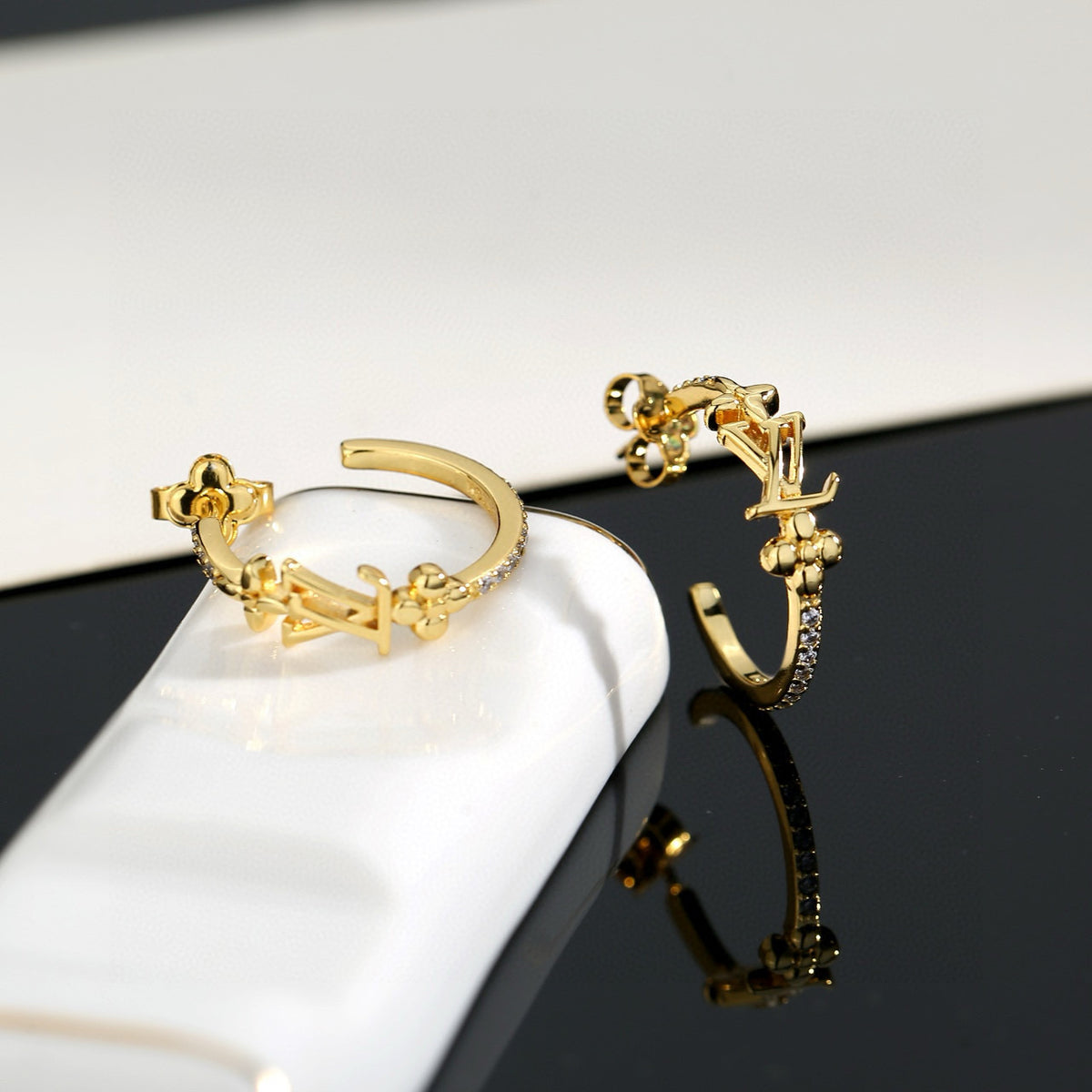 Louis Vuitton LV Letter Stud Earrings - album image 2