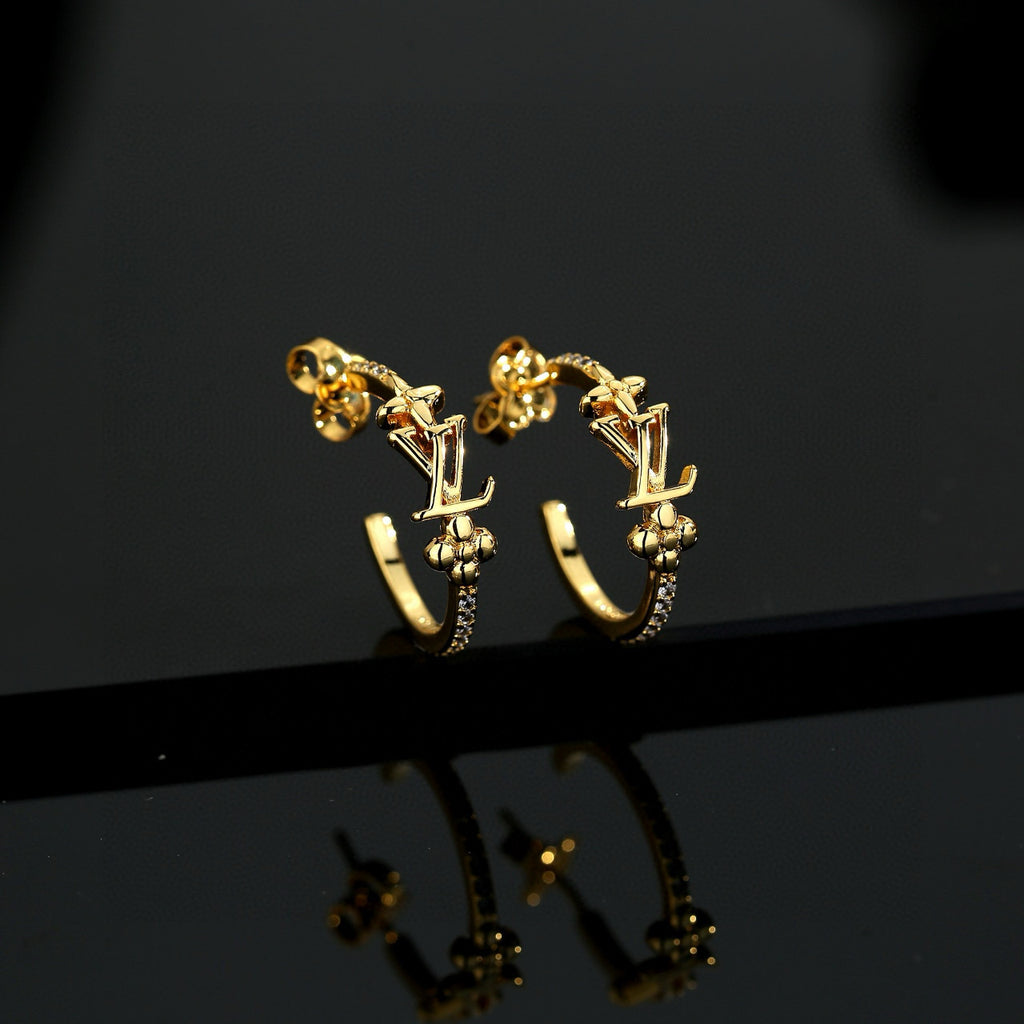 Louis Vuitton LV Letter Stud Earrings - album image 5