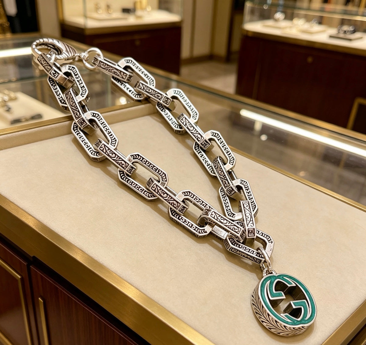 Gucci Silver-Tone Oval Link Bracelet with Blue Circular Charm - album image 4