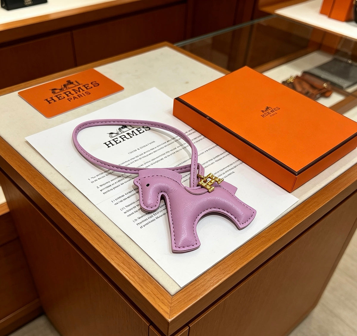 Hermès Lavender Leather Horse Bag Charm - album image 1