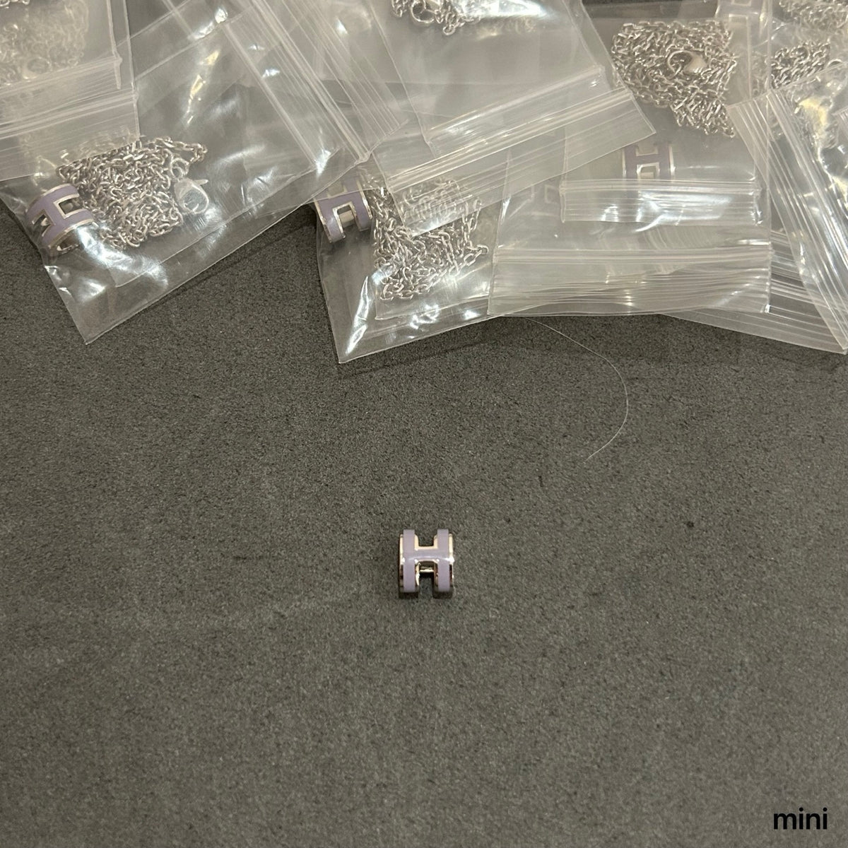 Hermès Silver-Tone Mini H Stud Earrings - album image 1