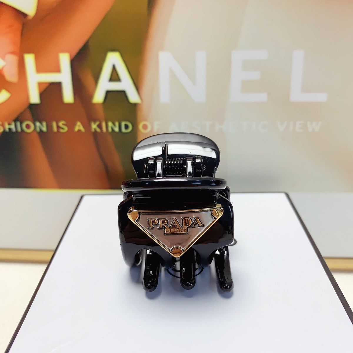 Prada Black Triangle Plaque Claw Clip - album image 1