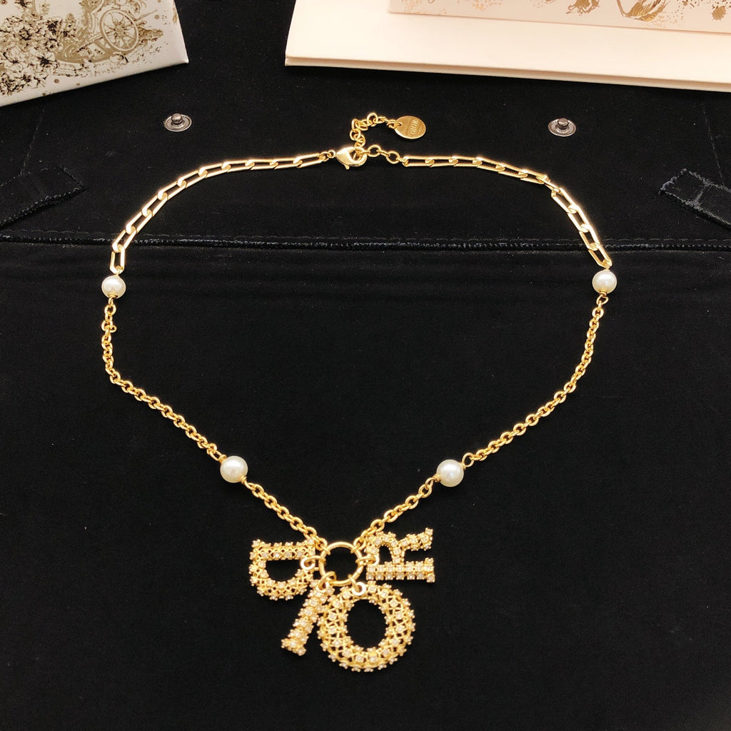 Dior Asymmetric Bow and Round Pendant Necklace - product image 3