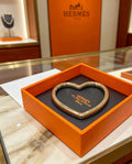 Hermès Black Leather Gold-Tone Turn-Lock Cuff Bracelet - album image 1