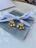 Dior Asymmetric Medallion Stud Earrings - product image 1