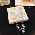 Dior Silver-Tone Floral CD Necklace - product image 1