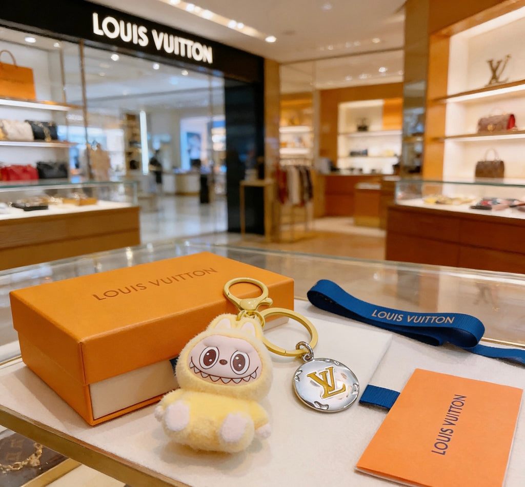 Louis Vuitton White Hooded Plush Character Bag Charm - album image 1