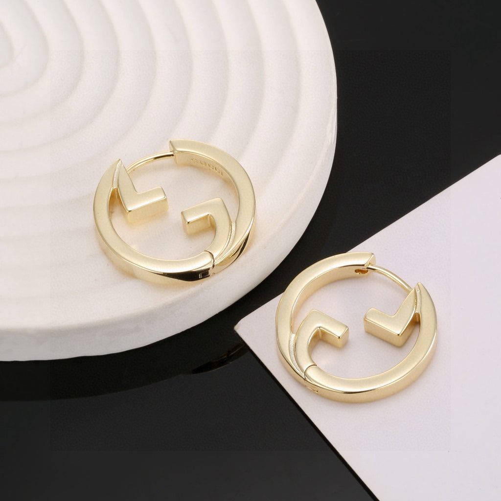Gucci Gold-Tone Circular G Stud Earrings - album image 1