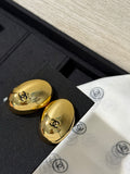 Chanel Interlocking C Enamel Gold-Tone Black Earrings - album image 1