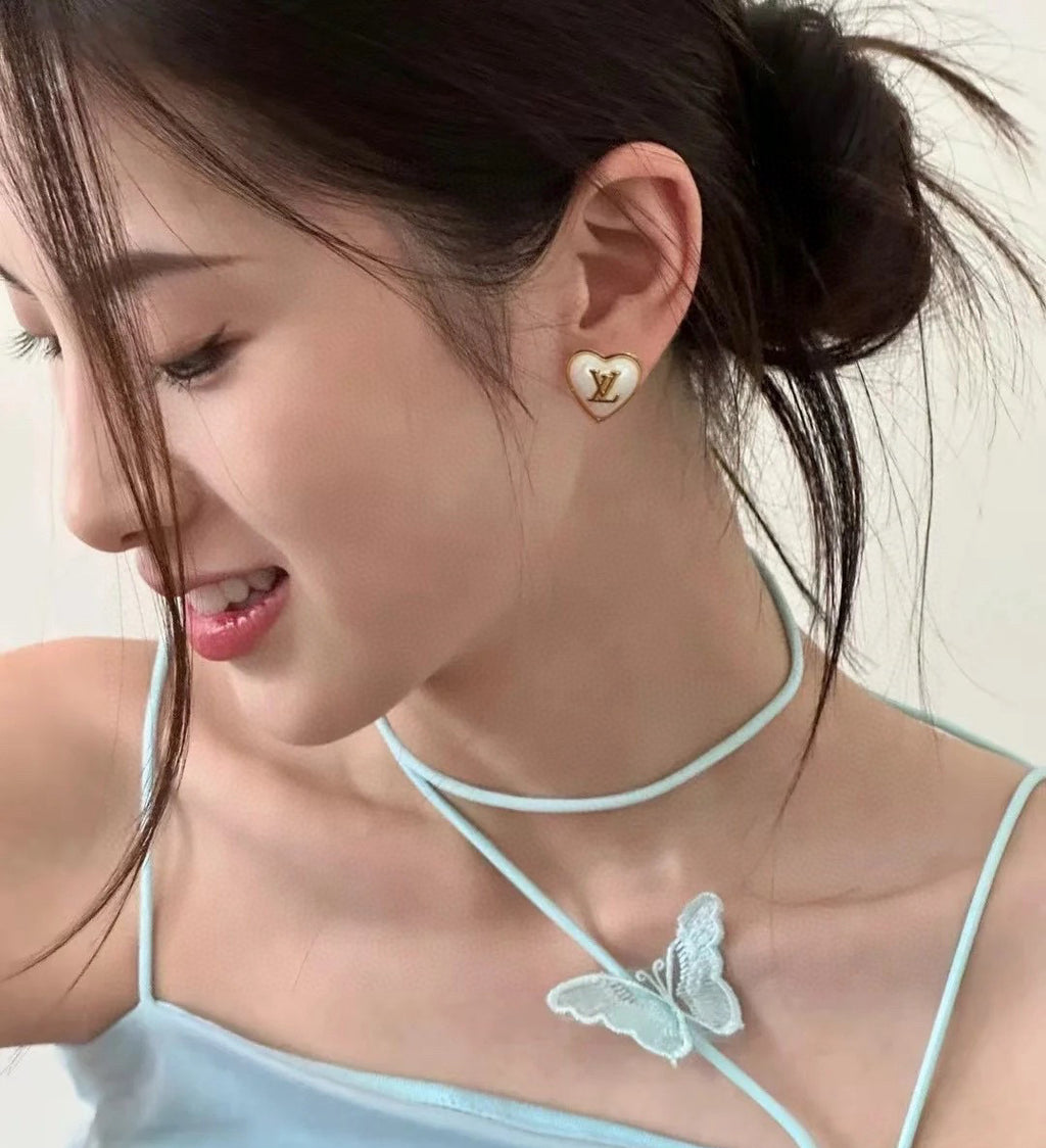 Louis Vuitton Heart LV Letter Stud Earrings - album image 6