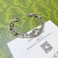 Gucci Silver-Tone Engraved Open Bangle - album image 1