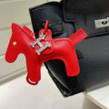Hermès Red Leather Horse Bag Charm - album image 1