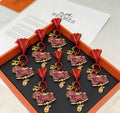 Hermès Red Letter-Patterned Horse Plush Toy - album image 1